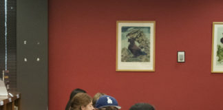 With the help of college students and coloring books, elementary students rediscover the joys of learning