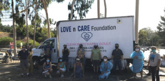 Volunteers host shower event for unhoused Eagle Rock residents Volunteers stand in front of the Love N Care Foundation shower truck at an unhoused shower event on Figueroa Street in Los Angeles, CA.
